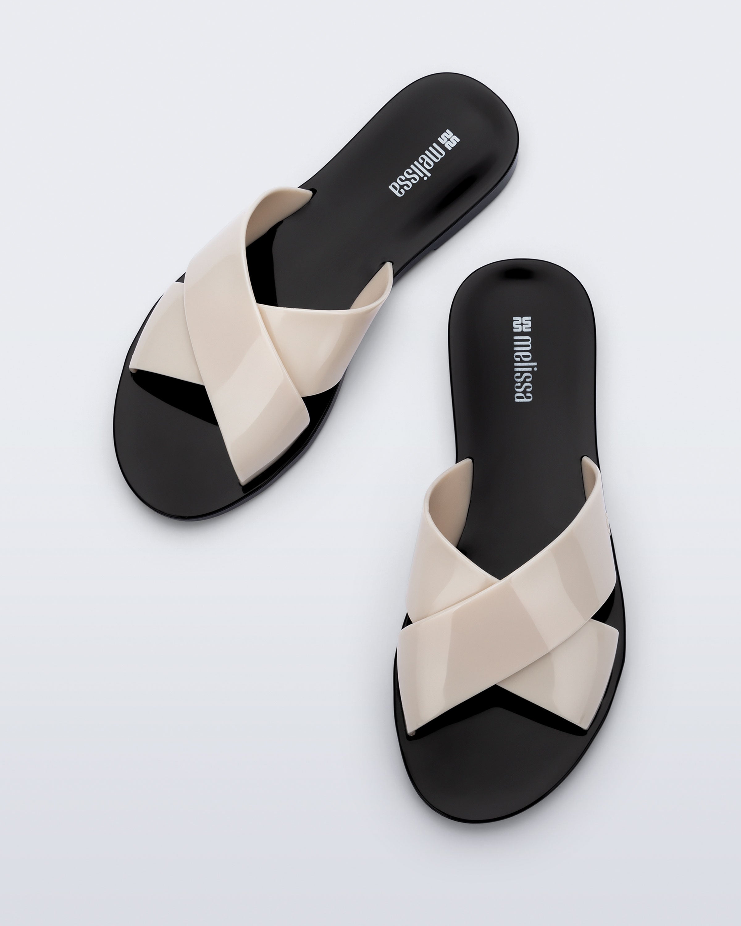 MELISSA ESSENTIAL CROSS SLIDE AD
